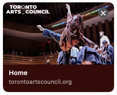 Dynamic dance performance with a dancer extending an arm and leg, audience in the background, Open Graph image of Toronto Arts Council.